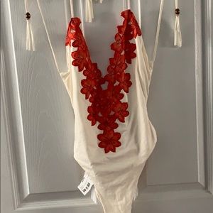 Never worn, with tags! Blue Life Mirage one piece